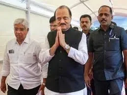 ajit-pawar-last-rites-sons-light-pyre